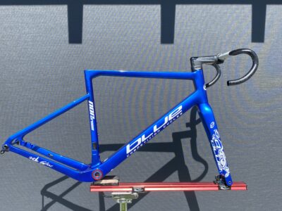 Blue Competition Cycles 2024 Norcross frameset with bars and stem, ML